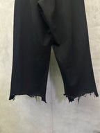 Balenciaga black wide-leg pants, elastic waist, frayed hem details