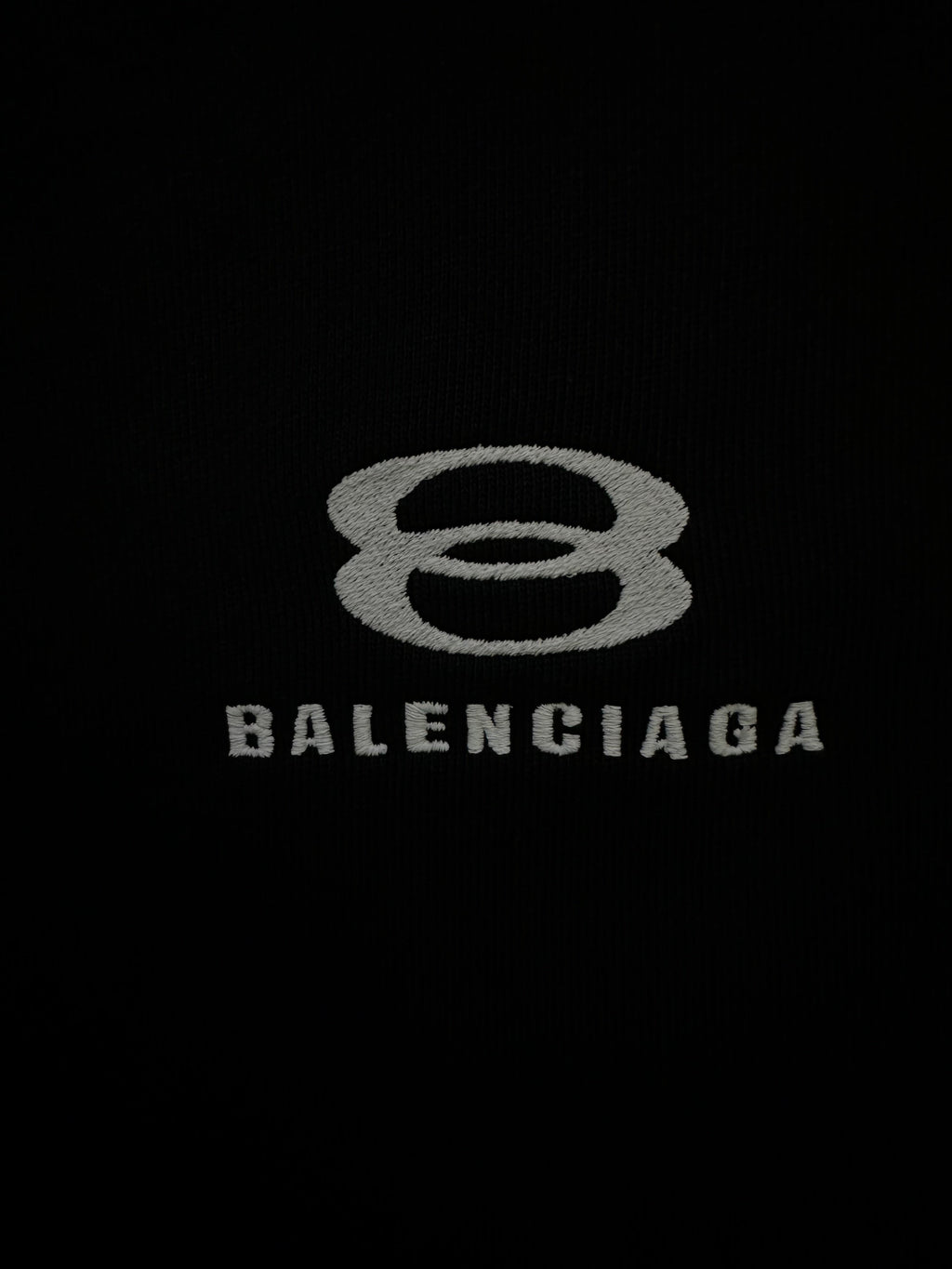 Balenciaga logo print on black fabric