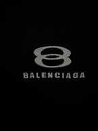 Balenciaga logo print on black fabric