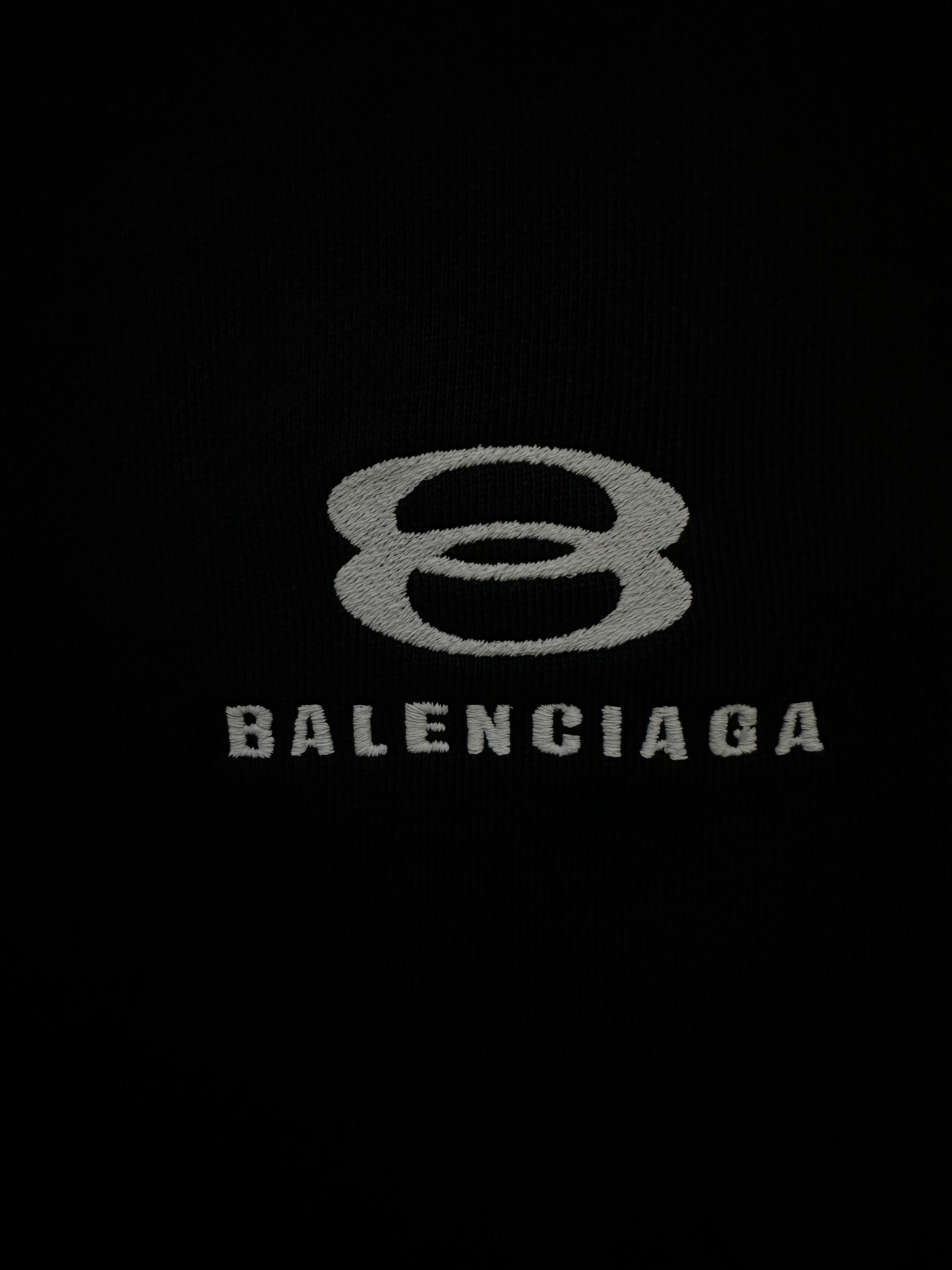Balenciaga logo print on black fabric