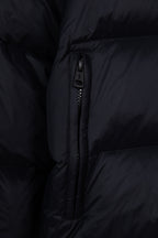 Moncler long puffer jacket center zipper with puller on dark navy quilted panel