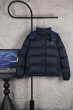 Moncler long puffer jacket in dark navy with front snap buttons and stand collar