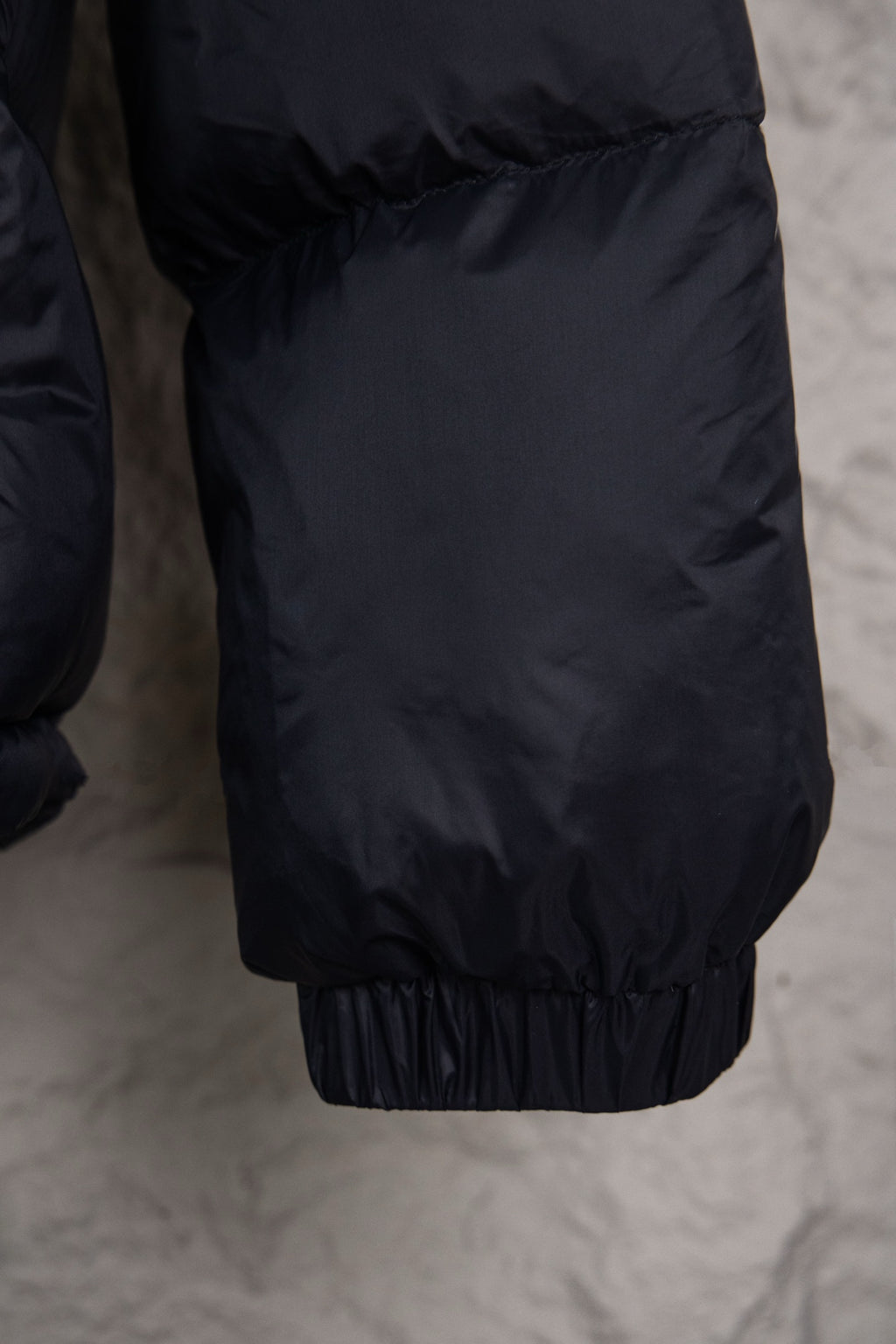 Moncler long puffer jacket, dark with gathered elastic hem