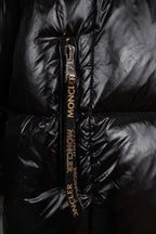 Moncler long puffer jacket close-up of branded zipper pull, black