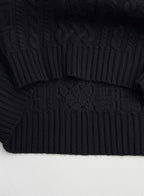 Versace black knit sweater with ribbed hem and textured knit pattern