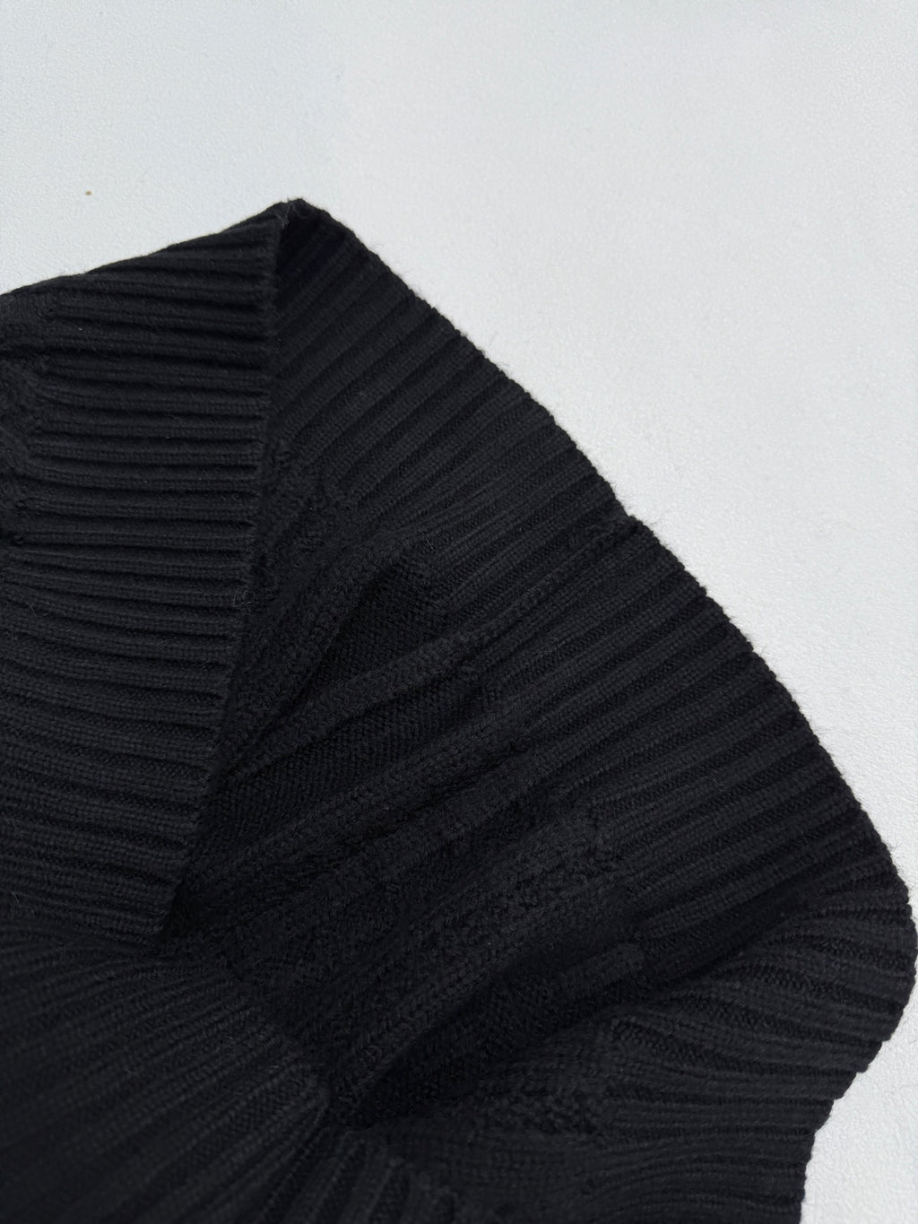 Versace black knit sweater sleeve and shoulder with ribbed detailing