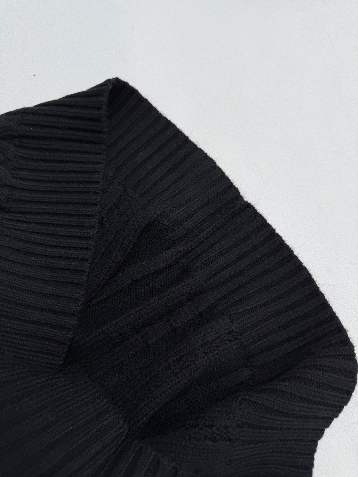 Versace black knit sweater sleeve and shoulder with ribbed detailing