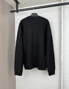 Versace black knit crewneck sweater with all-over cable and logo pattern
