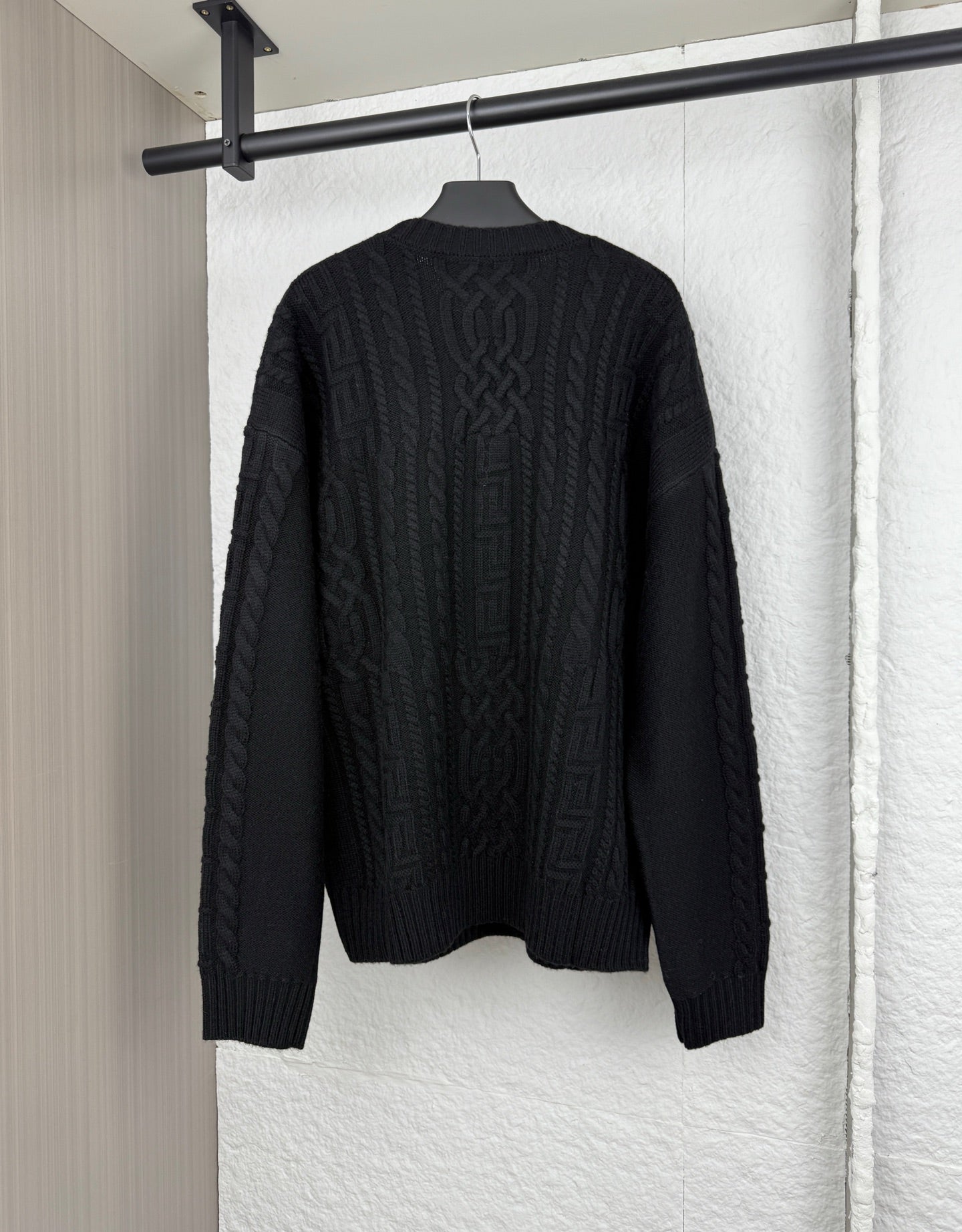 Versace black knit crewneck sweater with all-over cable and logo pattern