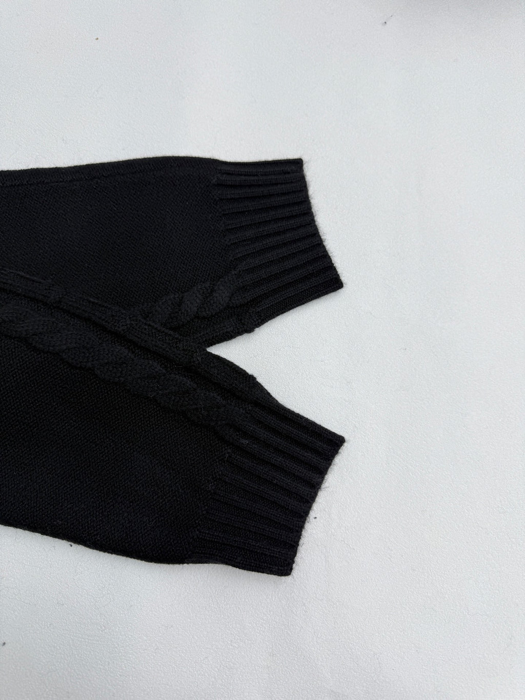 Versace black knit sweater sleeve with ribbed cuff