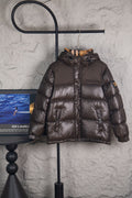Long puffer jacket in dark brown with front zipper and attached hood