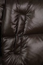 Long puffer jacket with central stitched panel and snap button placket