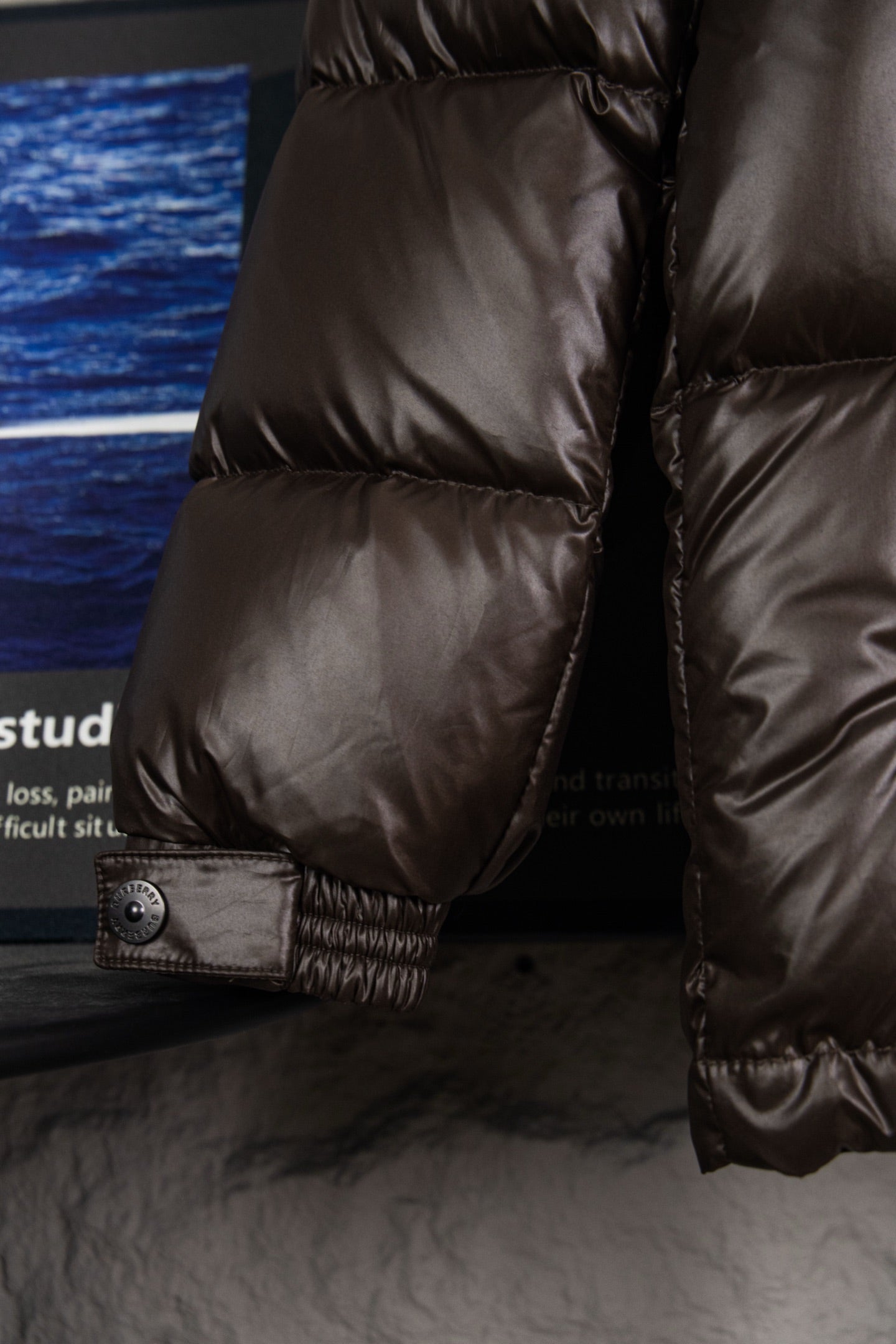 Burberry long padded jacket, dark brown with buttoned cuff and quilted panels