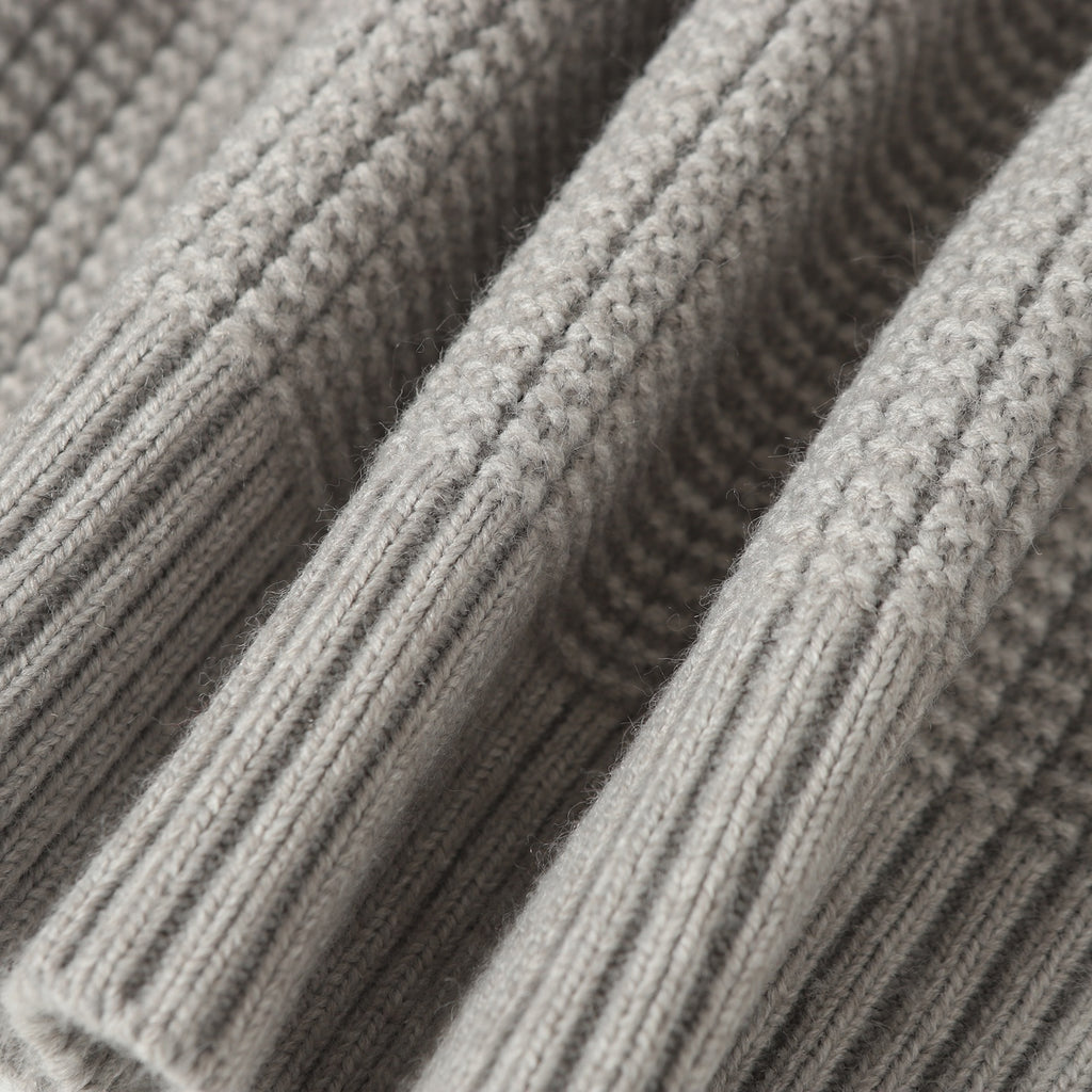 Light gray cable knit texture with raised ribbed pattern