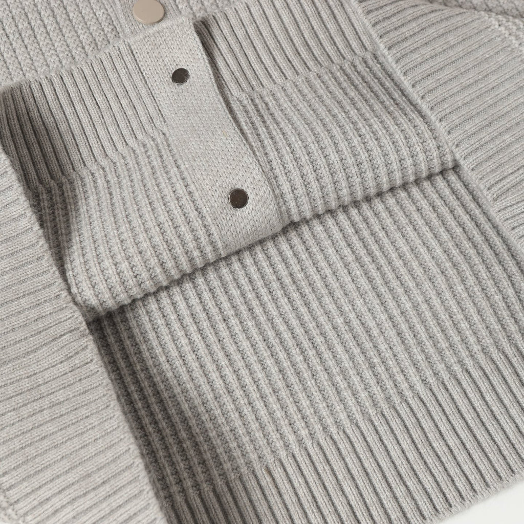 Light gray knit cardigan with button placket and ribbed cuffs