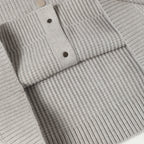Light gray knit cardigan with button placket and ribbed cuffs
