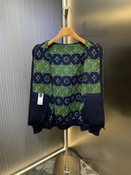 Navy Louis Vuitton hoodie with green-and-blue patterned back yoke panel.