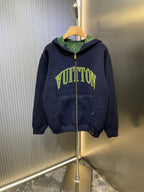 Navy Louis Vuitton zip-up hoodie with green logo print, hood, and front pockets.