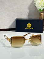 Versace sunglasses with amber lenses and gold geometric temple details, side view