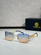 Versace sunglasses with gold frame and light tan lenses, front view