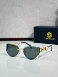 Versace gold metal aviator sunglasses with tinted dark lenses and logo detail temples