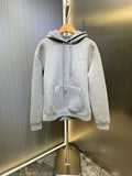Light gray Gucci hoodie with hood, drawstrings, and front kangaroo pocket