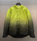 Lime green hooded jacket with GG pattern, snap front, and dark gray lower panels