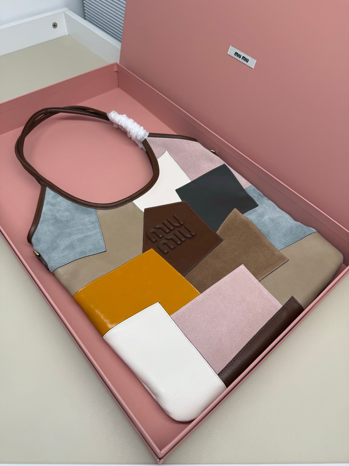 MiuMiu patchwork tote bag with top handle, multicolor suede/leather panels