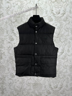 Prada sleeveless black puffer vest with button front and stand collar
