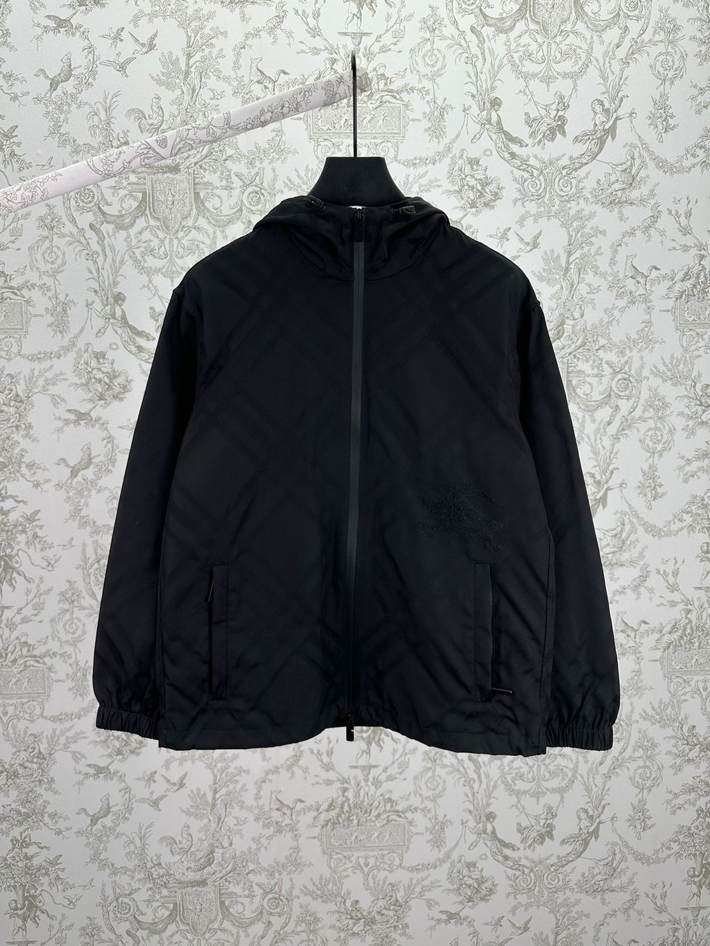 Hooded puffer jacket with front zipper, dark color, long sleeves