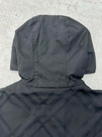 Hooded puffer jacket with draped hood and check-pattern lining, dark color