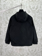 Hooded puffer jacket back view with raised hood, dark color