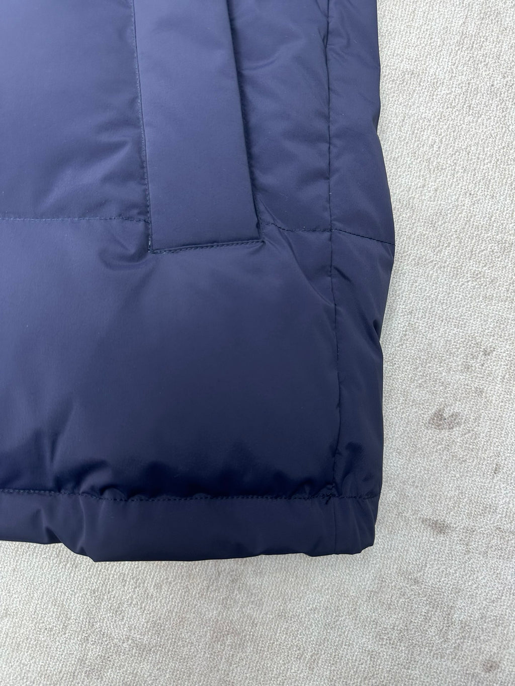 Long puffer jacket hem with quilted padding, dark blue