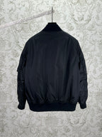 Navy bomber jacket back view with ribbed cuffs and waistband