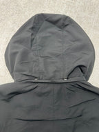 Dark hooded jacket with gathered hood and folded collar