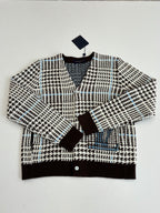 Button-front knit cardigan with black-and-white check pattern and brown ribbed trim