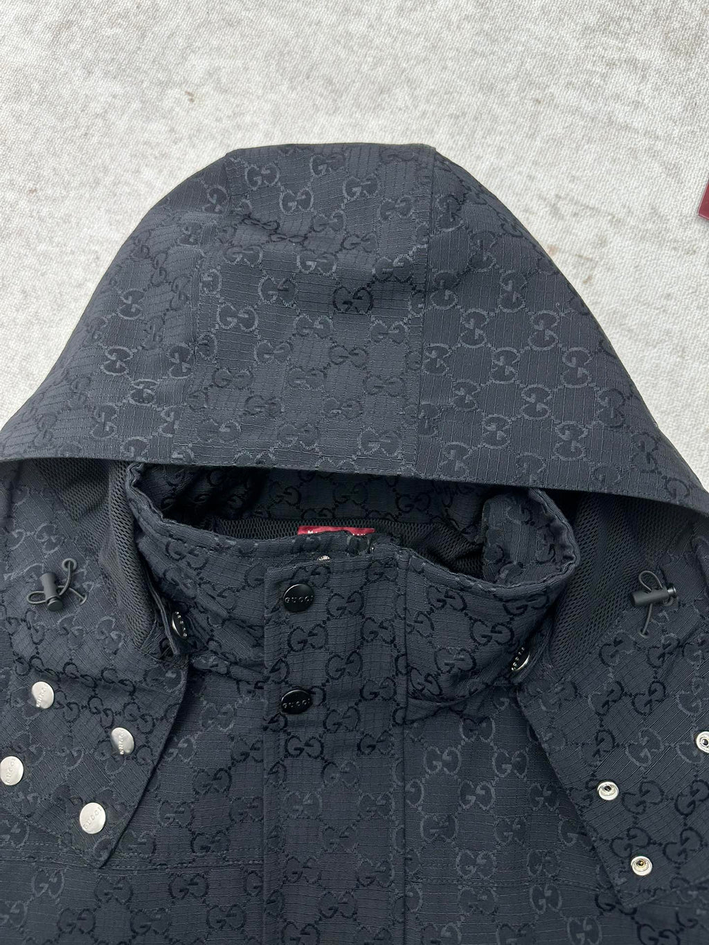 Gucci long jacket interior hood and snap buttons, dark with GG monogram pattern