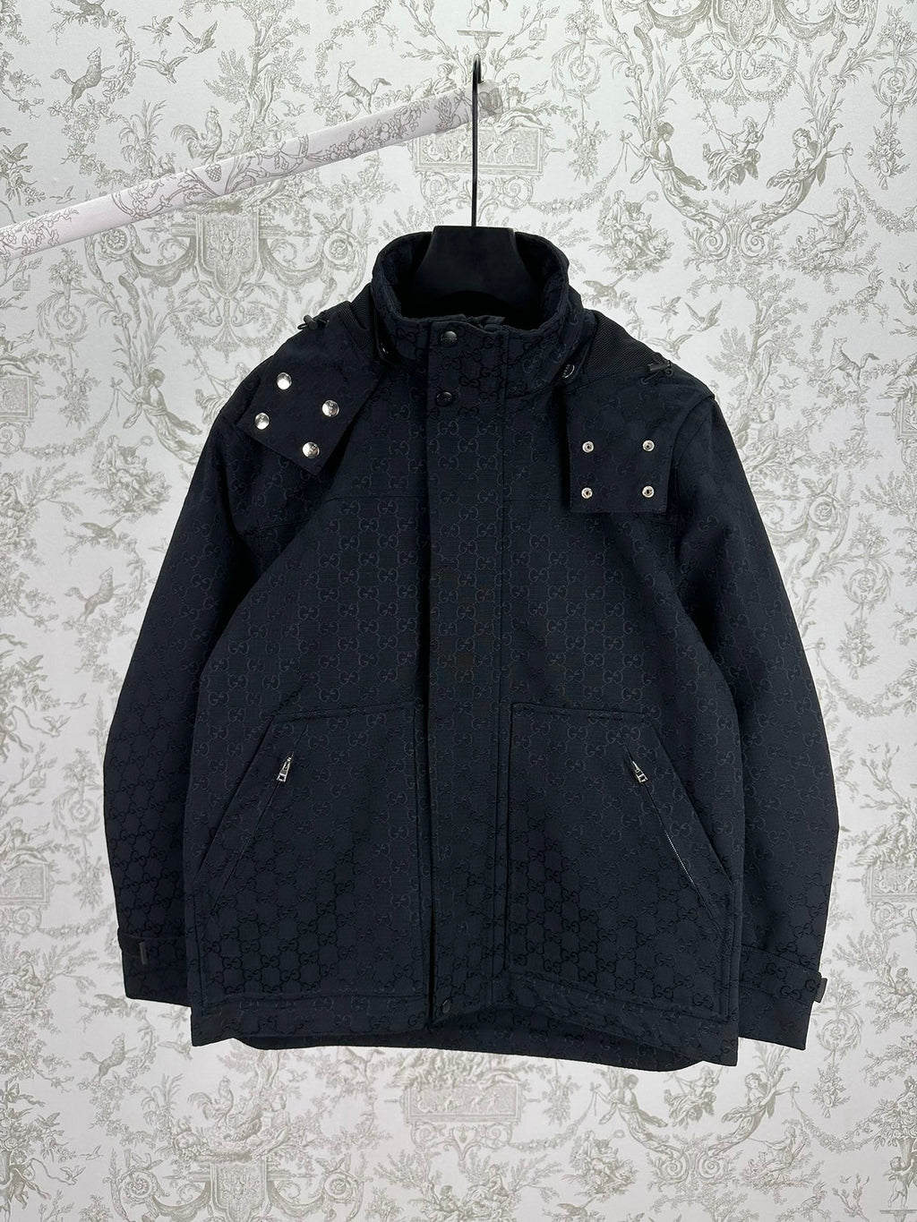 Gucci hooded long jacket, dark with studded shoulders and front zip closure