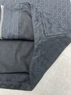 Gucci long jacket side view, dark with inner mesh panel and zipper area