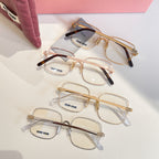 Multi-pack of eyeglass frames in gold and silver with clear lenses
