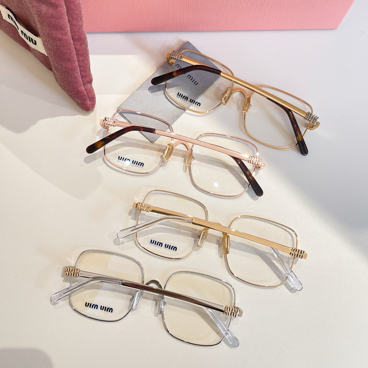 Multi-pack of eyeglass frames in gold and silver with clear lenses