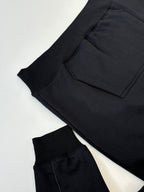 Dior hoodie sleeve and kangaroo pocket detail in black