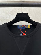 Black crewneck sweatshirt neckline detail with Polo Ralph Lauren label