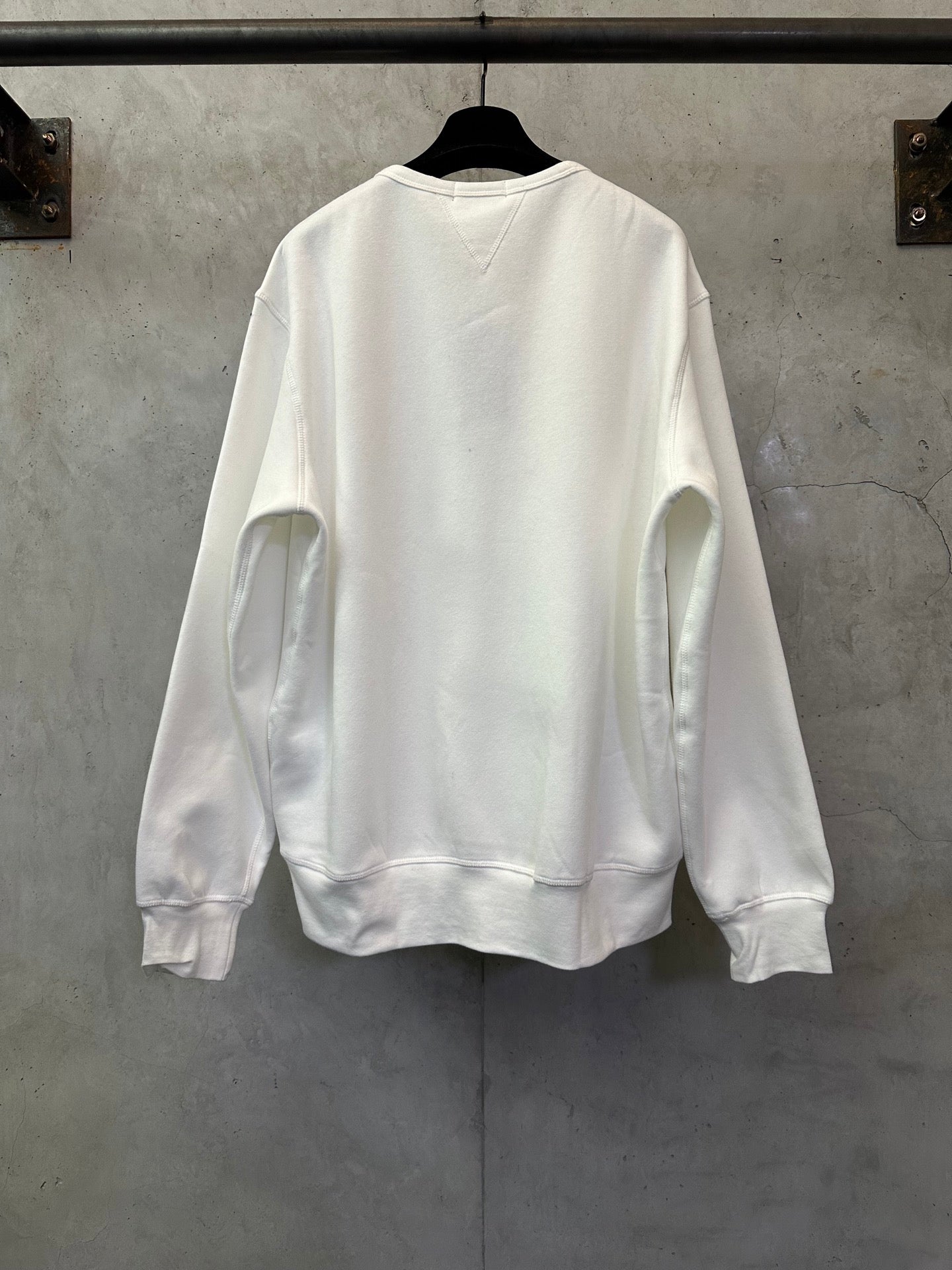 White crewneck sweatshirt, back view