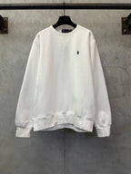 White crewneck sweatshirt with small Polo logo on the chest