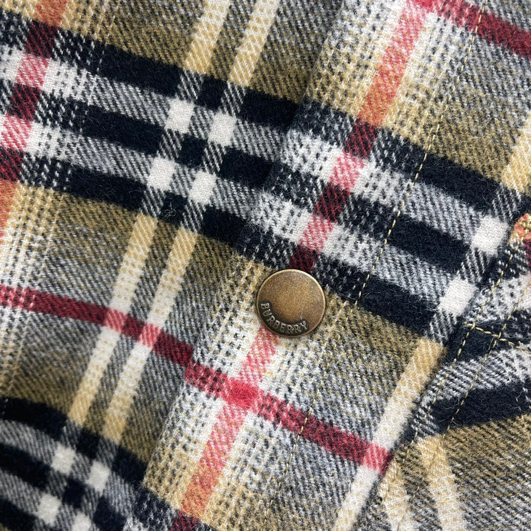 Burberry plaid fabric with round metal button