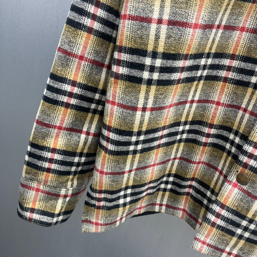 Burberry plaid jacket sleeve and hem with buttoned cuff and chest pocket