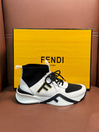 White and black high-top sneakers with black laces and side logo detail