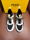 White and black high-top sneakers with black laces and contrast logo panels