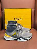 Fendi unisex ankle-high sneakers in light gray with yellow logo and chunky white sole